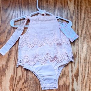 2 matching pink onesies